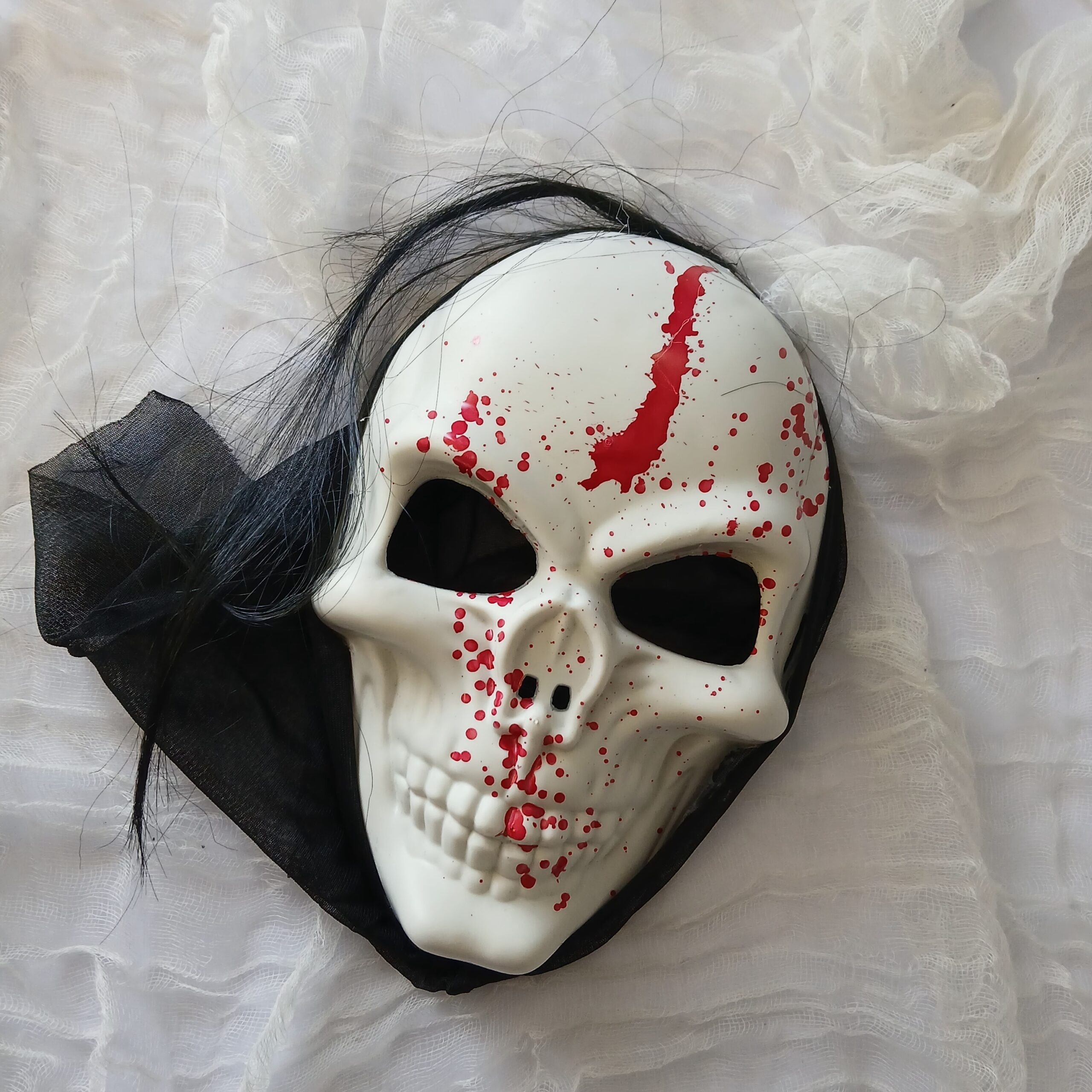 Blood spattered skull mask